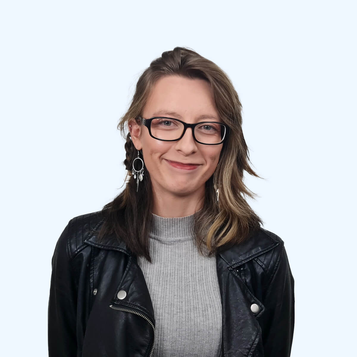 A headshot of an employee from Chaos Theory Games.