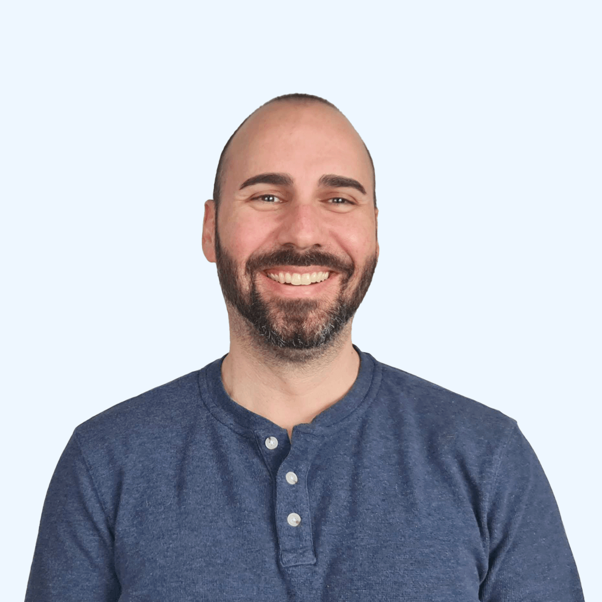 A headshot of an employee from Chaos Theory Games.